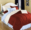 Bed made with rose full size reversible comforter