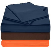 T130 Flat Sheets in multiple colors folded and stacked.