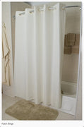 White Karlon 150 Hang2it shower curtain hanging on a shower curtain rod.
