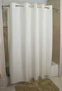 Beige Polly 300 Hang2it shower curtain hanging on shower curtain rod.