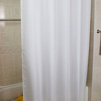 White Polly 300 Hang2it shower curtain hanging on shower curtain rod.