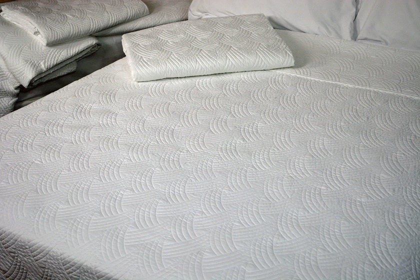 Bed made with Quilted Impressions Breezes Coverlet