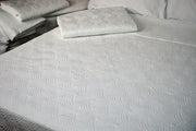 Bed made with Quilted Impressions Breezes Coverlet