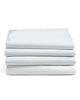 White T130 Flat Sheets folded and stacked.